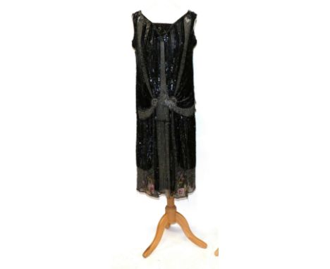 Circa 1920s Bead and Sequin Flapper Dress, applied to black net with black sequins, detailing with clear bugle beads, and a h