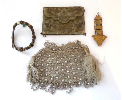 An 18th Century Picture Book/Purse in green silk, embroidered in silvered and gold threads with scrolling floral motifs, gree