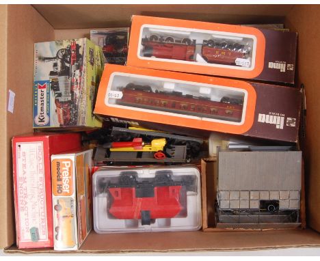 A large box of various items as removed from modellers workshop including various items of UK and Continental rolling stock i