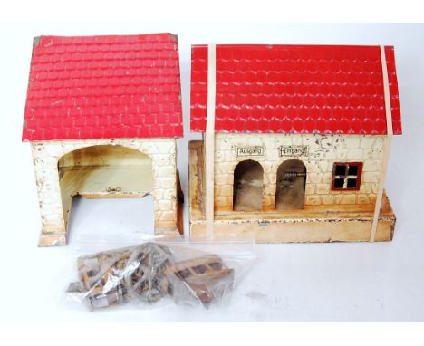 A Doll &amp; Cie early 20th century tinplate and lithographed two piece cable car set, electrically operated example comprisi