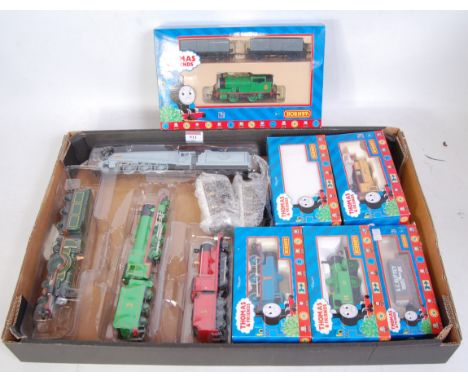 A Tray of Thomas and Friends items by Hornby (NMN-BMNM) Five Hornby engines, the smaller boxed ones.Four Bachmann engines in 
