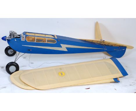 Radio Controlled model of a Majestic Major aircraft, fitted with engine, and supplied with a selection of spare parts, finish