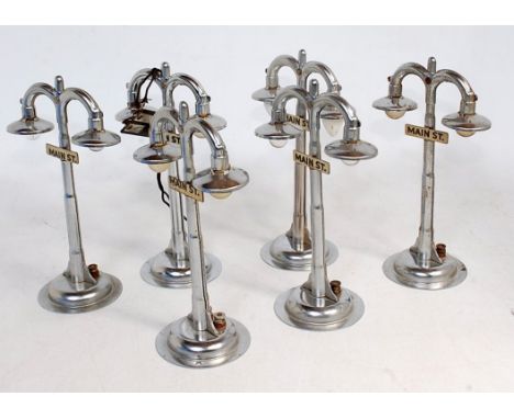 A small plastic tray containing 6x Marx American 'Main St' double lamp standards - silver colour, all (G) Not tested – sold a