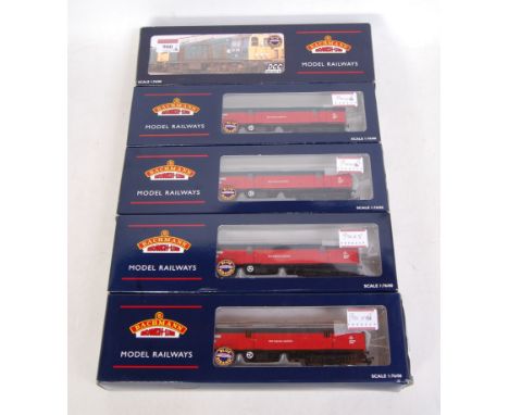 A Bachmann 32-032 BR blue factory weathered class 20 Bo-Bo diesel locomotive (NM-BNM) together with 4x 39-270 BR Mk1 GUV Rail