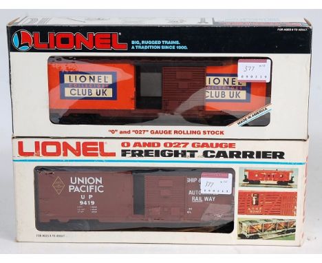 9 x boxed Lionel plastic bogie wagons including brown 2 x Union Pacific box cars, yellow Union Pacific stock Car, blue New Or