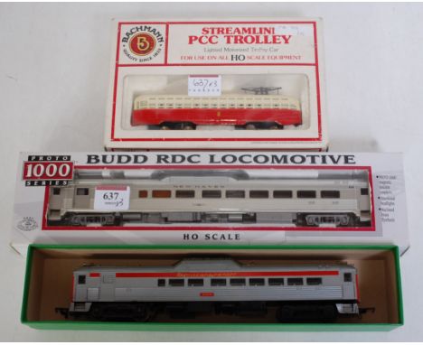 Triang TC series Budd RDC unit (G), a similar Life Like H0 New Haven rail car (M-BM) and a Bachmann PCC trolley car (G-BG)