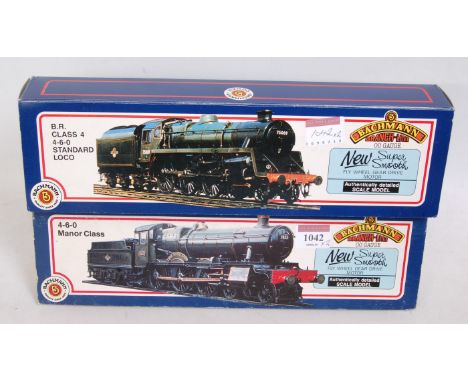 Bachmann BR green 31-301 "Dinsmore Manor" engine and tender (NM-BNM) and a BR lined green 31-104 class 4 double chimney 4-6-0