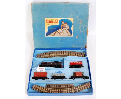 A Hornby Dublo0-6-2 tank goods train set containing glass black locomotive and 4 wagons, all items good for age, box lid has 