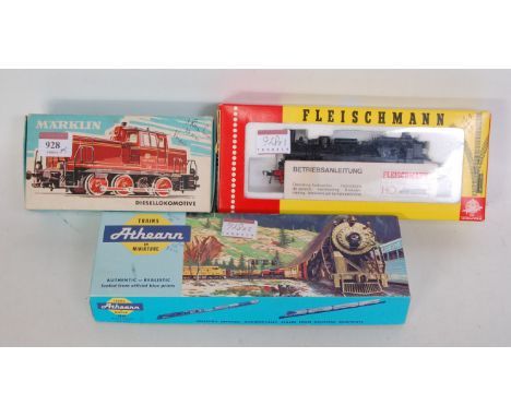 A Fleischmann H0 DR black class 94 0-10-0 tank engine (VG-BG), a Marklin H0 DB red 0-6-0 diesel shunter (G-BG), and an Athear