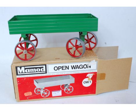 A Mamod TE1A boxed traction engine, appears as issued, with original card packaging, together with a Mamod OW1 open wagon, al