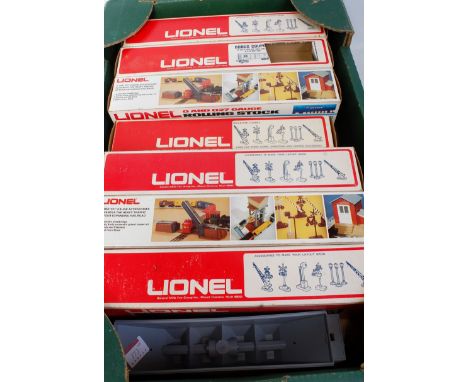 7 assorted Lionel plastic bogie hopper wagons including orange D &amp; RGW long covered, maroon Sun Maid billboard, brown Pen