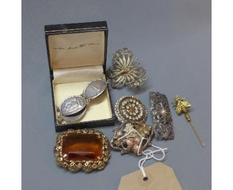 An early 20th century English silver bracelet, makers initial LIL, together with five vintage costume jewellery brooches and 