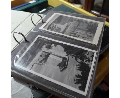 A large collection of vintage postcards in many folders, contained in four boxes 
