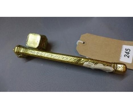 A Ottoman brass scribes quill holder with integrated inkwell, with engraved floral decoration, L.23cm 