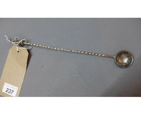 An Islamic silver spoon, with Islamic script and star and crescent moon decoration to bowl, twisted stem and finial, stamped 