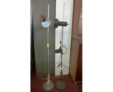 A 1970's Danish two light standard lamp, on circular base, together with a similar single light standard lamp, (2) 