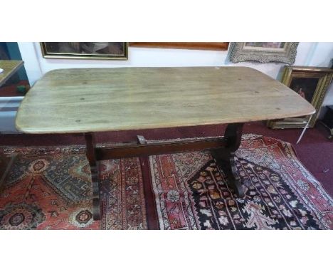 An Ercol elm topped refectory style table, H.70 L.155 W.75cm 