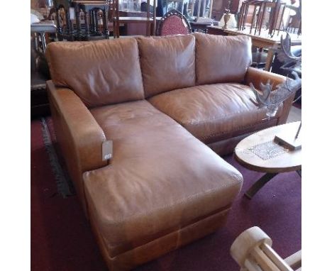 A contemporary tan leather corner sofa 