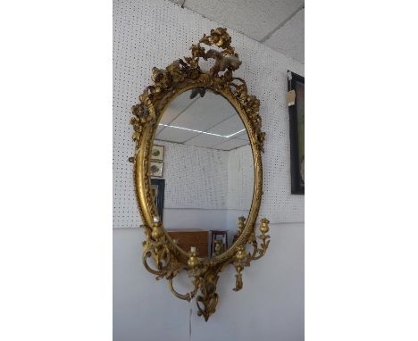 A large and impressive 19th century giltwood girandole with eagle and floral finial, H.150cm W.80cm 