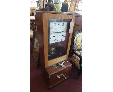 A National Time Recorder Co. Ltd clocking in clock, with key and winder, in working order, H.94cm 