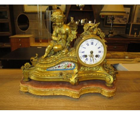Victorian Gilt Metal and Porcelain Panel Clock Surmounted by a Cherub, The Movement by H. Marc Paris, 35cm long, 25cm high 