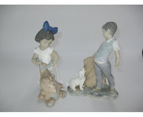 Two Nao Figures, Boy with Dog and Girl with Toy Lion 