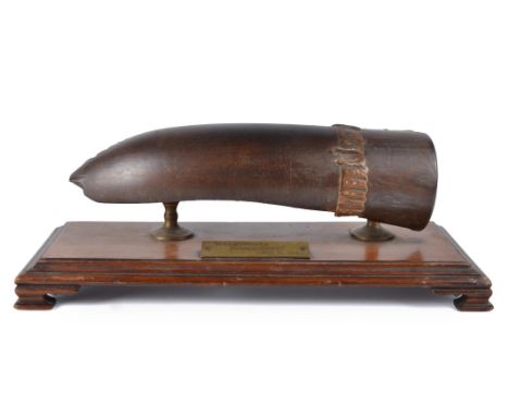 A large display mounted shell fragment, being a relic of the German naval bombardment of Scarborough 16th December 1914: an a