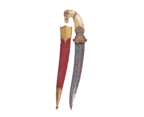 λ A fine Indian dagger (khanjar), double curved blade 10 in., hollow ground with a medial ridge; marine ivory hilt finely car