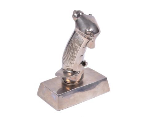 An aluminium ornament in the form of a warplane's control stick, purportedly commissioned as a car mascot, permission for thi