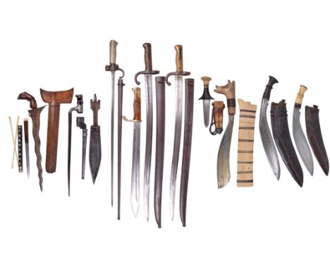  A collection of edged weapons, including: a good kukri, blade 15 in. with incised decoration along the back, steel hilt, lea