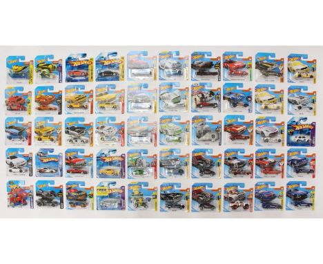 Hot Wheels: A collection of approx. 90 Hot Wheels carded vehicles to include: Off-Road, Checkmate, First Editions, Screen Tim