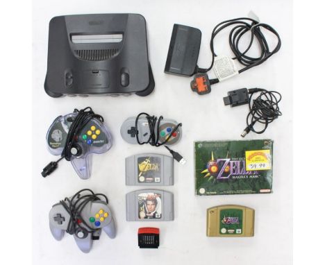 Nintendo: An unboxed Nintendo 64 black console, complete with power supply, official controller and two others, untested. Tog