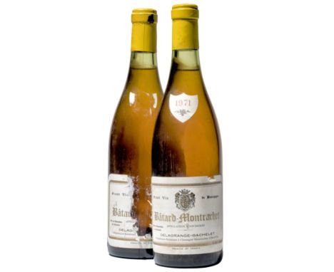 2 bottles Batard-Montrachet Grand Cru 1971 Cote de Beaune. Delagrange-Bachelet One torn capsule. One nicked label, one very d
