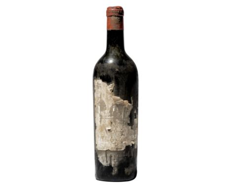 1 bottle Chateau Mouton Rothschild 1929 Pauillac, 1er cru classe Slighlty corroded capsule. Very damaged label, vintage not v