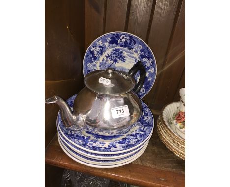 A silver plate teapot and some Wedgwood blue and white plates 