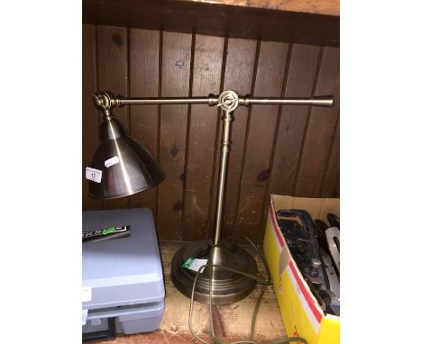 A metal adjustable anglepoise style lamp. 