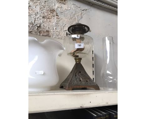 Cast and glass oil lamp with white shade and funnel 