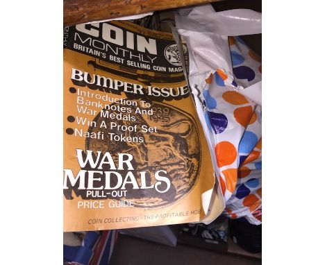 A bag of coin monthly and treasure hunting magazines 