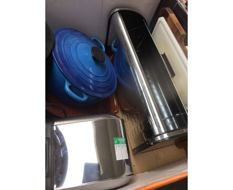 A box of kitchen items to include blue Le Creuset cooking pot. 