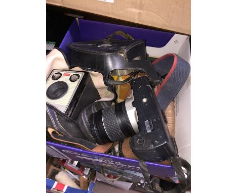 A box of cameras to include Bell &amp; Howell cine camera, Canon, Kodak, Beirette, etc 