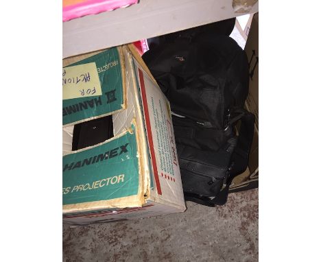 A box containing a projector, telescope, and camera bags etc 