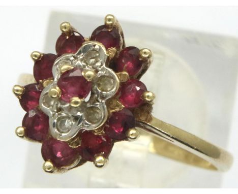 9ct gold diamond and ruby daisy ring, size N, 2.7g. P&amp;P Group 1 (£14+VAT for the first lot and £1+VAT for subsequent lots