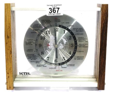 Japanese Sens quartz world time battery operated table clock, working at lotting, 24 x 20 cm. battery cover is missing. P&amp