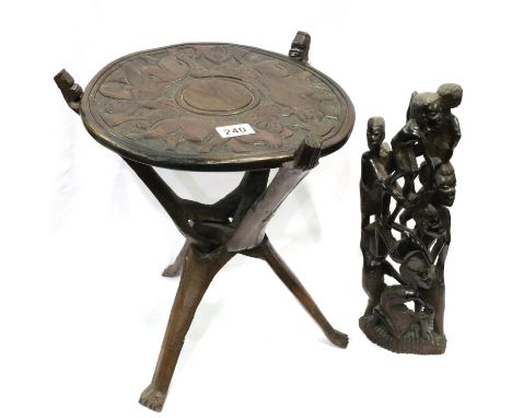 African Tribal Art table and a carved African group, table D: 30 cm. P&amp;P Group 3 (£25+VAT for the first lot and £5+VAT fo