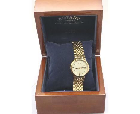 Rotary; quartz day date gold plated wristwatch in a wooden case, requires battery. P&amp;P Group 1 (£14+VAT for the first lot