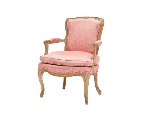 A Louis XV-Style Beech-Framed Fauteuil, recovered in pink fabric, the moulded show frame with padded back support, arms and s