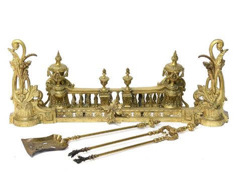 A Pair of French Gilt Metal Chenets and Fender Rail, late 19th century, with urn shaped finials issuing flambé suspending swa