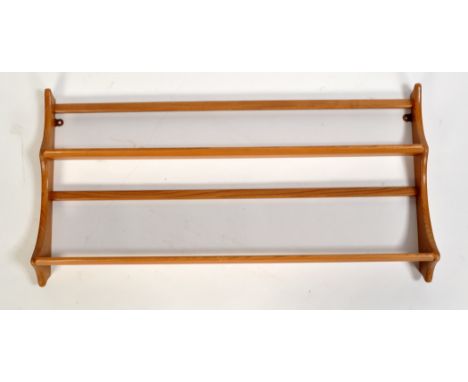 Ercol: an elm plate rack, the two tier rack with shaped supports, 97cms (38in.) wide.