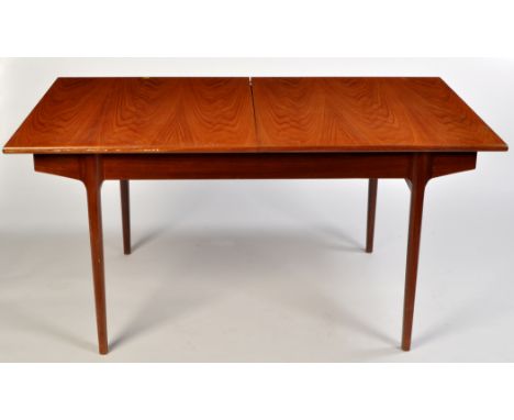 A teak extending dining table, c.1970's, the rectangular top raised on rectangular tapering legs, 152 x 90 x 74cms (60 x 35 1