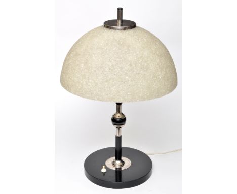 An Art Deco style table lamp, the crackle glass shade on ebonised and chromed stem, circular base, 53cms (21in.) high.